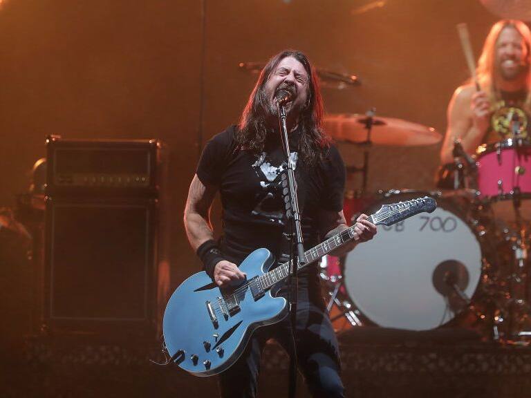 TEMPE, ARIZONA - FEBRUARY 26: Dave Grohl and Taylor Hawkins of Foo Fighters perform at The Innings Festival 2022 at Tempe Beach Park on February 26, 2022 in Tempe, Arizona. (Photo by John Medina/Getty Images)