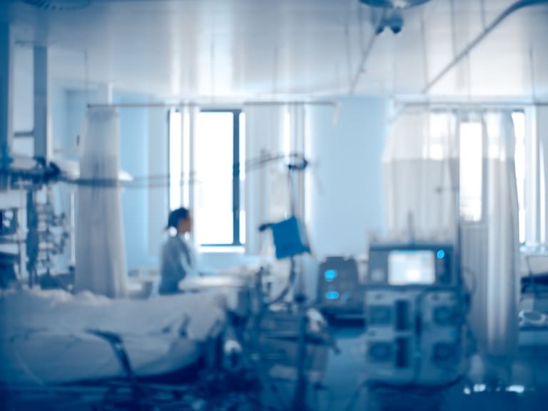 Equipped intensive care unit of modern hospital, unfocused background.