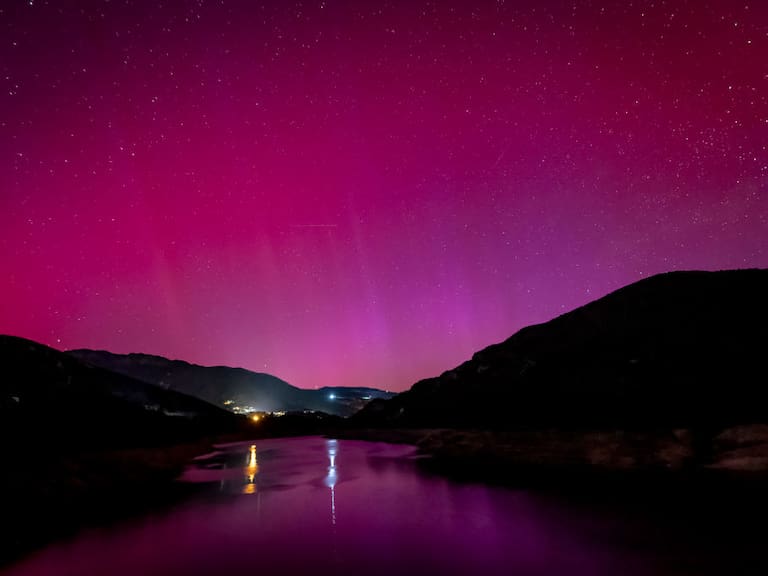 The northern lights, a result of the solar storms from May 2024, are visible from Berga, near Barcelona, on the night of May 10 to 11, 2024, in Barcelona, Catalonia, Spain. (Photo by Albert Llop/NurPhoto via Getty Images)